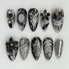 NEWSPIED front packaging showing 24-piece gothic press-on nails, ready-to-wear benefit