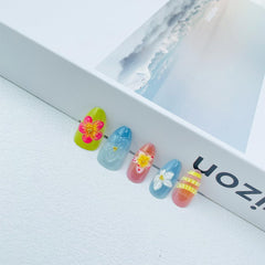 NEWSPIED nails applied on hand at a summer event, demonstrates wearable style