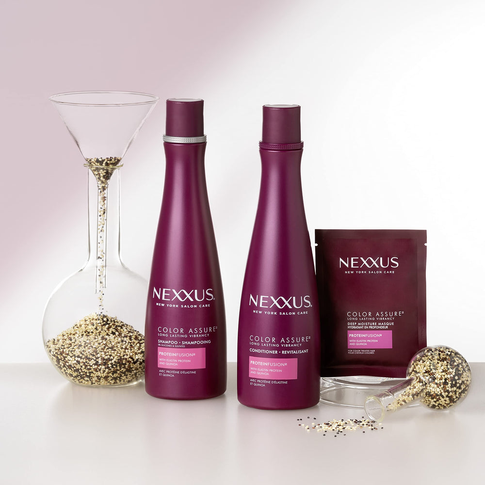 Nexxus duo bottles in hand showing true size and travel-friendly scale
