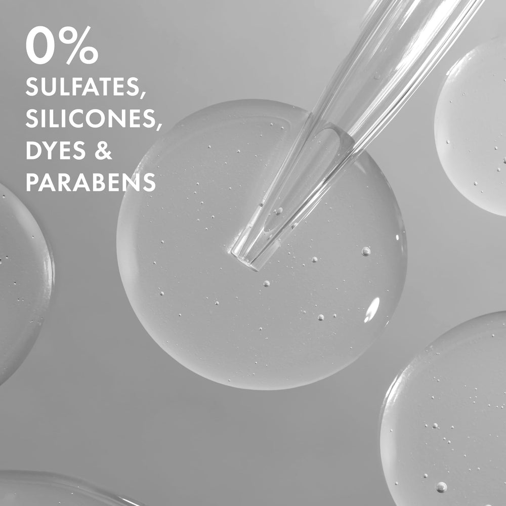 Nexxus conditioner in shower applied to hair demonstrating buildup removal benefit