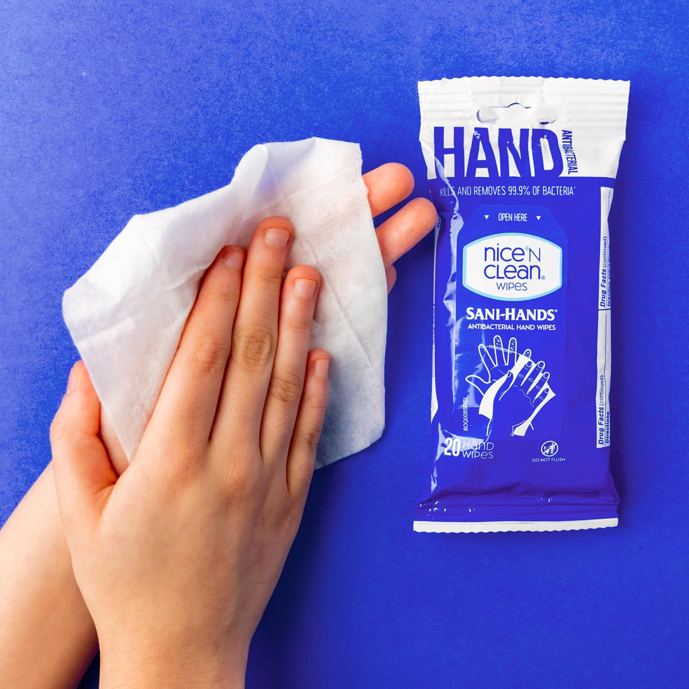 Nice 'N Clean wipe in use cleaning hands, demonstrating quick removal of dirt