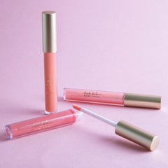 Nicole Miller open applicator close-up highlighting smooth glossy finish and easy application