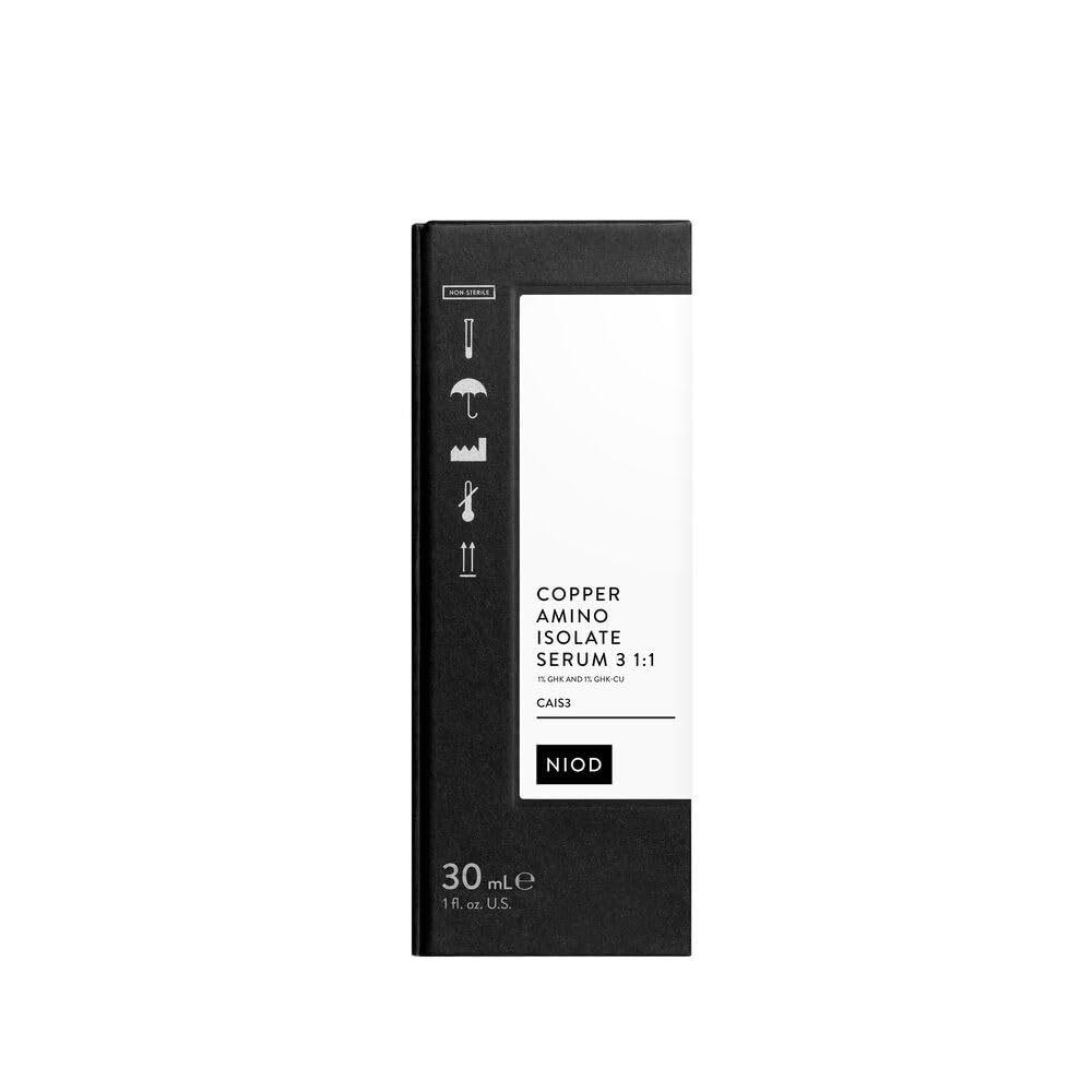 NIOD 30ml bottle beside scale marker, showing actual size and travel-friendly volume