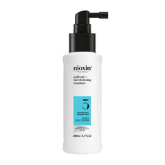 NIOXIN front bottle showing product and benefits for fuller-looking hair