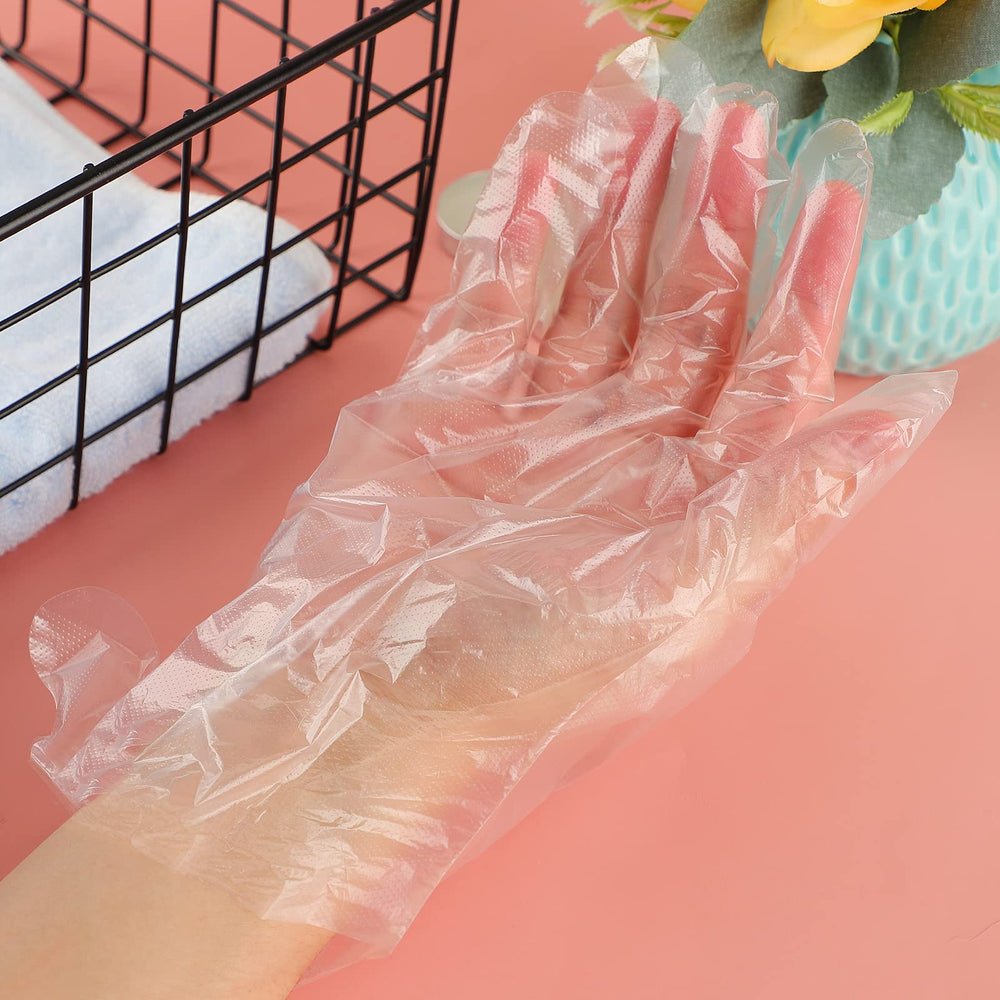Niubow liners on hands after paraffin to retain warmth