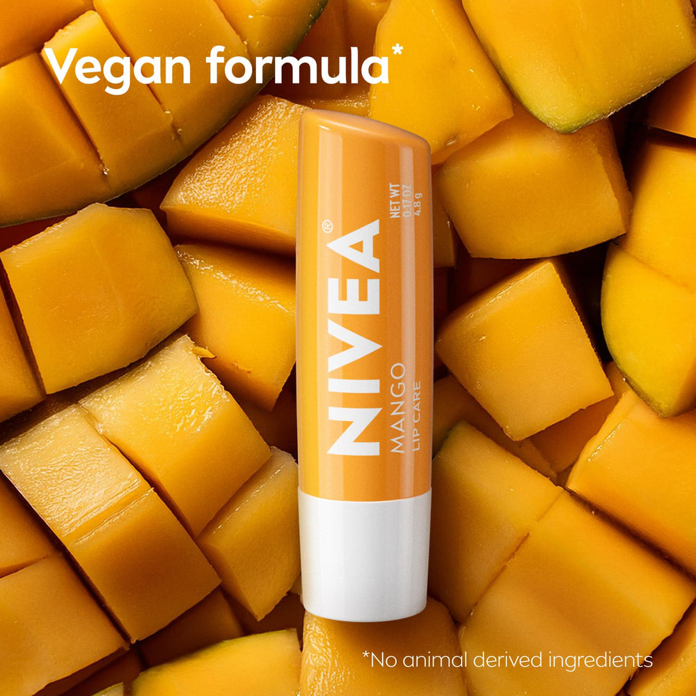 NIVEA lip balm beside fresh mango signaling natural scent and flavor benefit