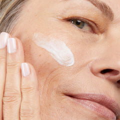No7 serum drop on skin displaying lightweight texture and fast absorption benefit