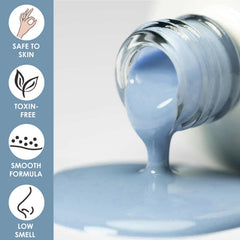 NovaCharm brush pulling a smooth blue stroke to demonstrate easy, even application benefit