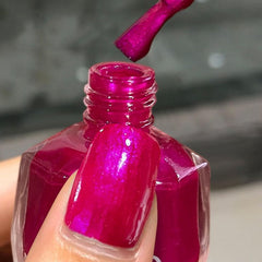 NovaCharm bottle front packaging showing hot pink color and label benefit