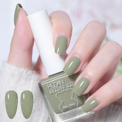 NovaCharm bottle front view showing sage green polish and glossy finish benefit