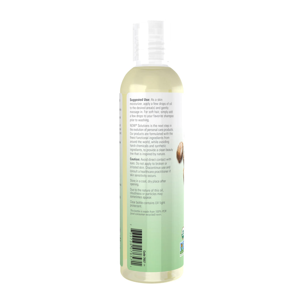 NOW Foods oil poured from bottle showing thick viscosity and concentrated conditioning benefit
