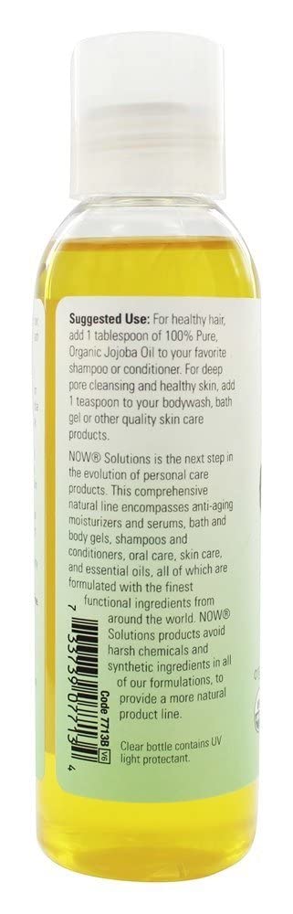 NOW Foods jojoba oil beside bathtub and towel illustrating calming bath hydration