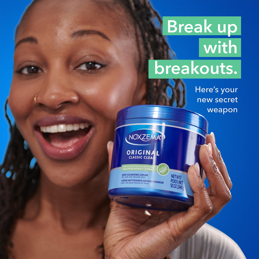 Open jar with small spoon of Noxzema cream demonstrating easy application