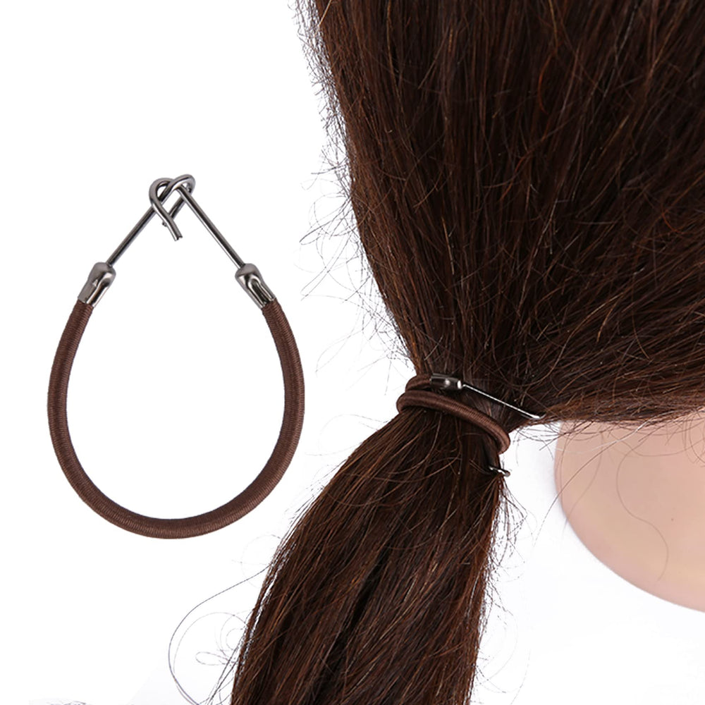 NSBELL hair ties beside a ruler to show approximate nine-inch stretch