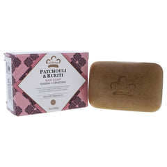 Nubian Heritage soap placed on bathroom tray suggesting portable use and fragrant bathing