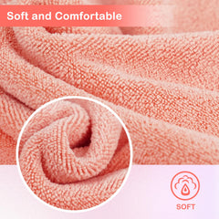 NUGILLA cloth held in hand demonstrating 12x12 inch size and coverage