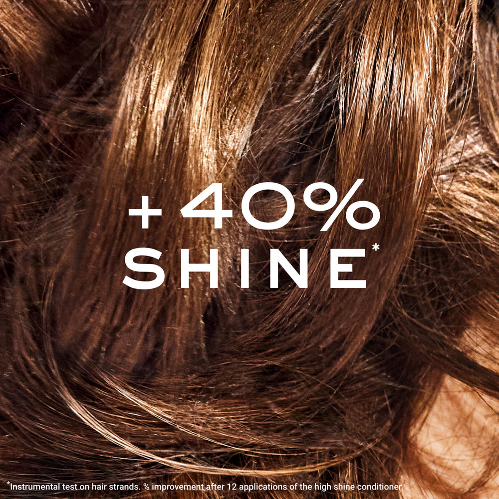 NUXE conditioner being applied to hair demonstrating easy spread and nourishment