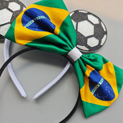 Nxtpz close-up of bow knot detail highlighting printed satin texture and vibrant colors