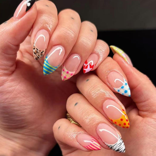 Nxtpz front packaging showing French tip polka dot nails and included accessories for quick manicures