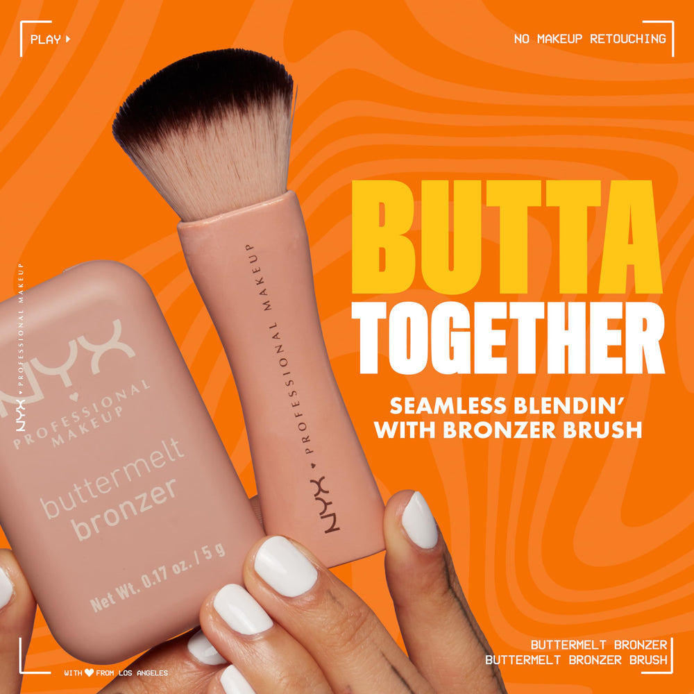 NYX PROFESSIONAL MAKEUP bronzer compact held in hand showing size and portability