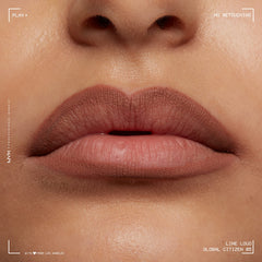 NYX Line Loud beside a hand for scale showing travel-friendly size benefit