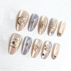NZRAESTRS front packaging showing gold star press-on nails for instant glam