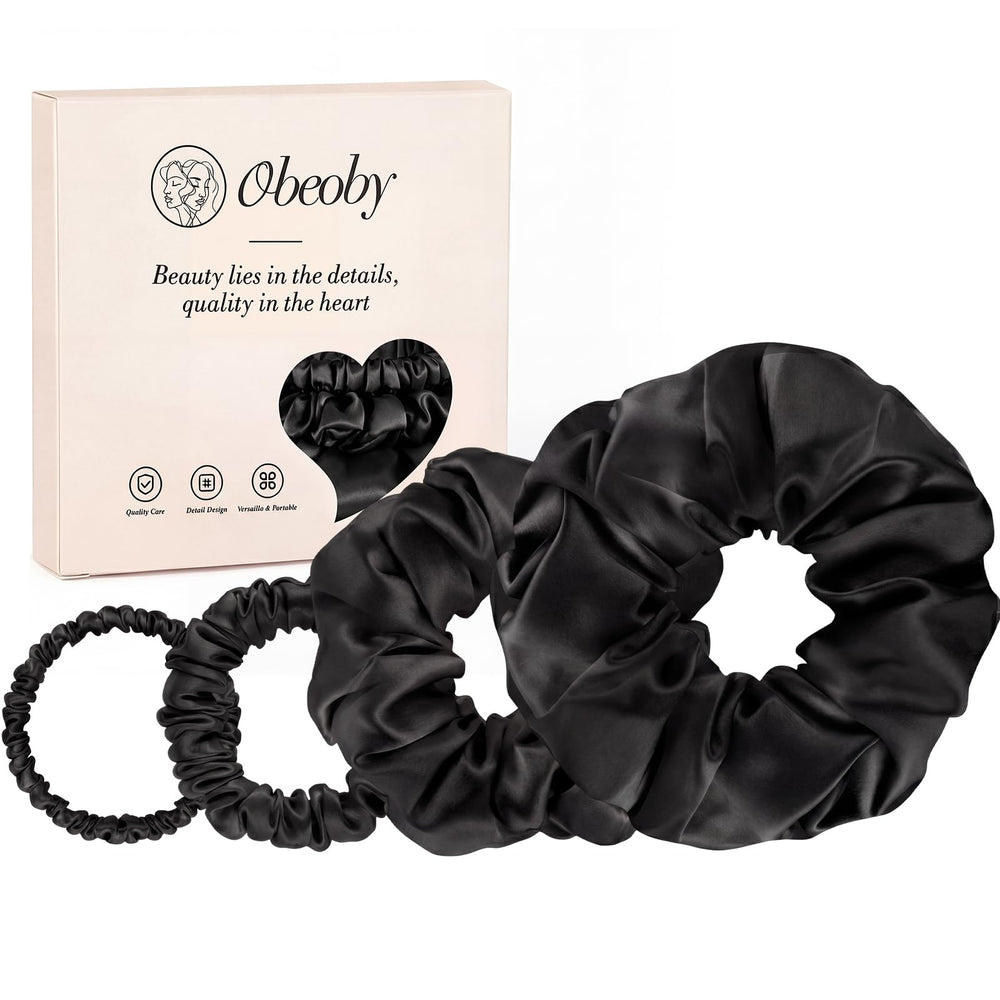 obeoby front packaging showing four black silk scrunchies as neat set and durable design