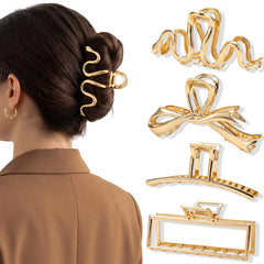 obeoby front view of four gold metal hair clips showing polished finish and designs, stylish accessory