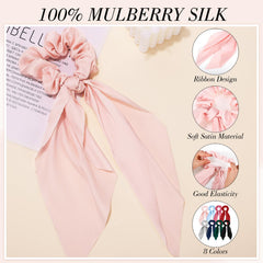 obeoby half-up hairstyle with scarf-style bow creating soft, feminine accent