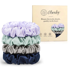 obeoby sage green scrunchie front view shows smooth silk and gentle hold