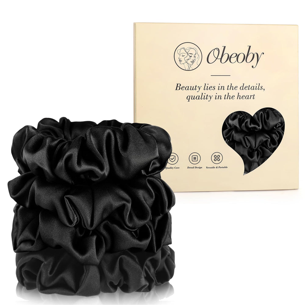 obeoby front view of black silk scrunchie shows smooth finish and elegant sheen