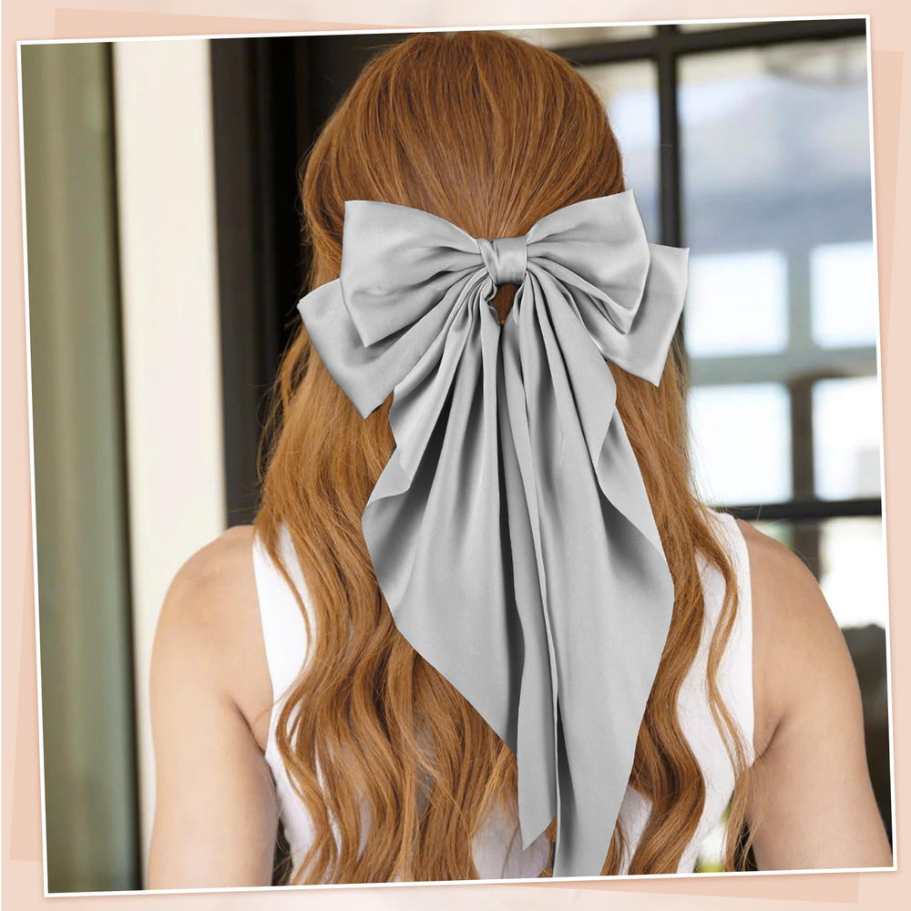 obeoby bow next to ruler showing size and generous ribbon length benefit
