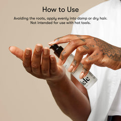 Odele oil applied to hair mid-lengths showing frizz control and added shine