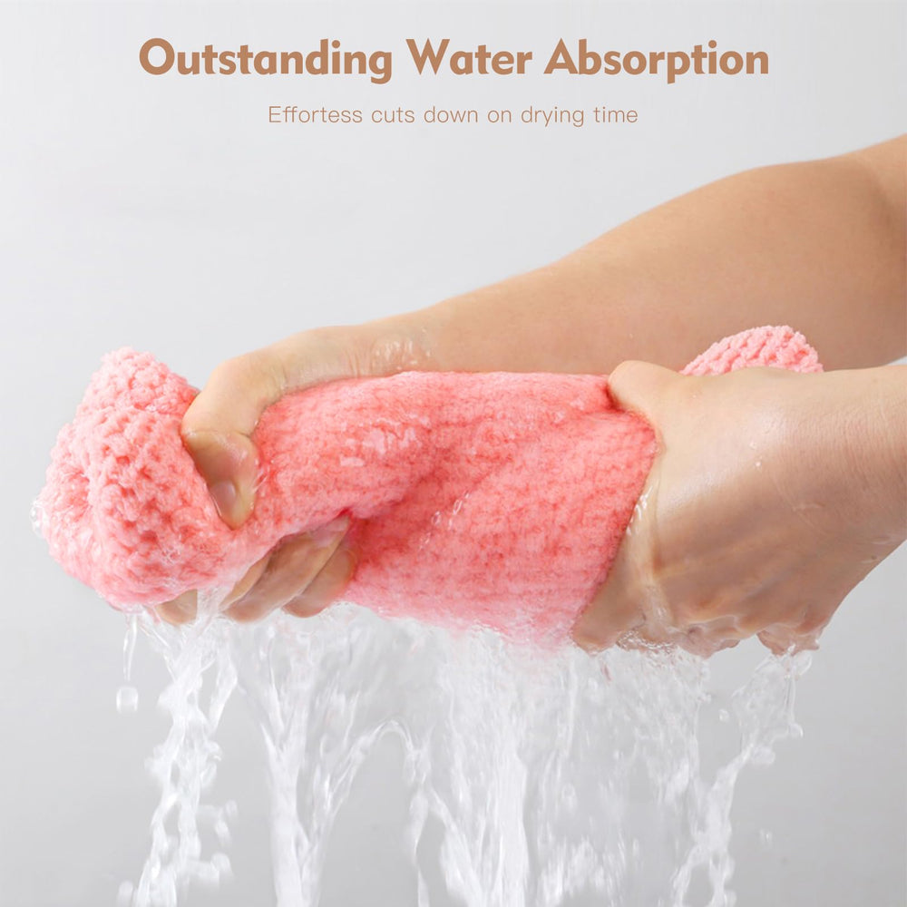 OEAGO towel beside hand for size comparison showing lightweight, travel-friendly scale