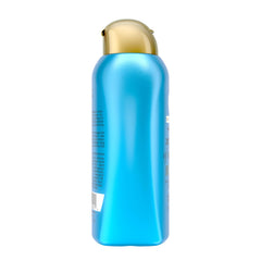 OGX cold-pressed argan oil with product to highlight nourishing benefit