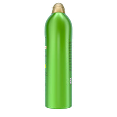 OGX bottle styled on bathroom shelf conveying clean, spa-like routine