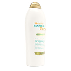 OGX shampoo in shower scene showing in-use hydration and frizz control