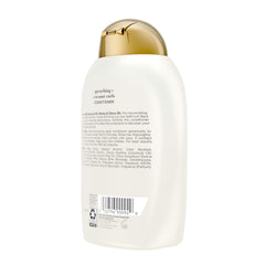 OGX conditioner applied in shower detangling curly wet hair