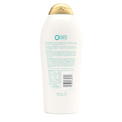 OGX bottle on bathroom counter styled in bright lifestyle setting