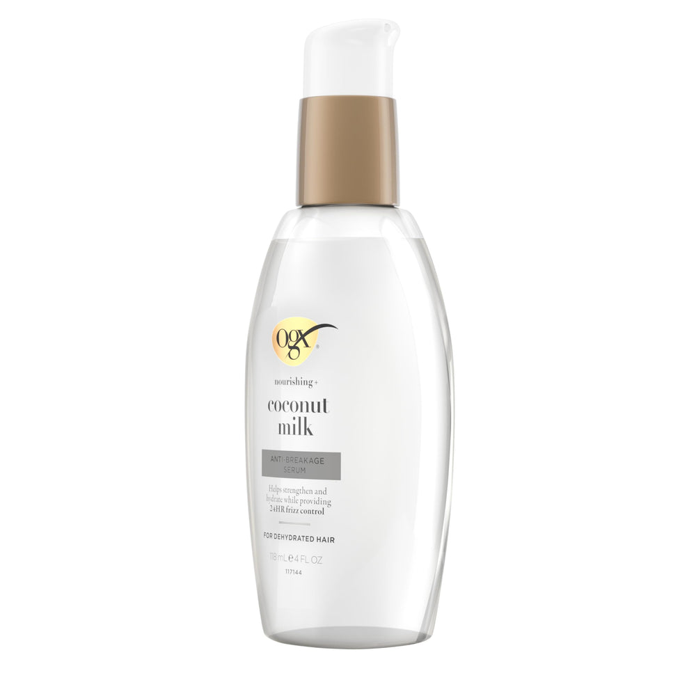 OGX serum applied to damp hair mid-lengths illustrating detangling and reduced breakage