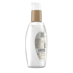 OGX serum paired with matching shampoo and conditioner to show a complete routine