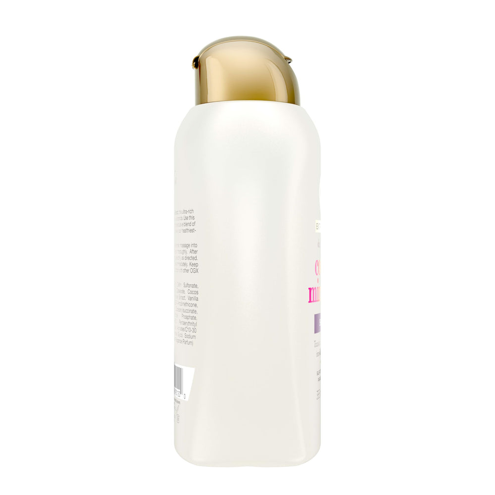 OGX shampoo being applied in shower to tame frizz and soften