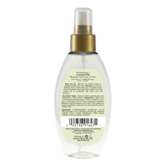 OGX ingredient label close-up showing coconut oil and bamboo extract