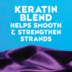 OGX conditioner cream texture close-up illustrating rich moisturizing slip