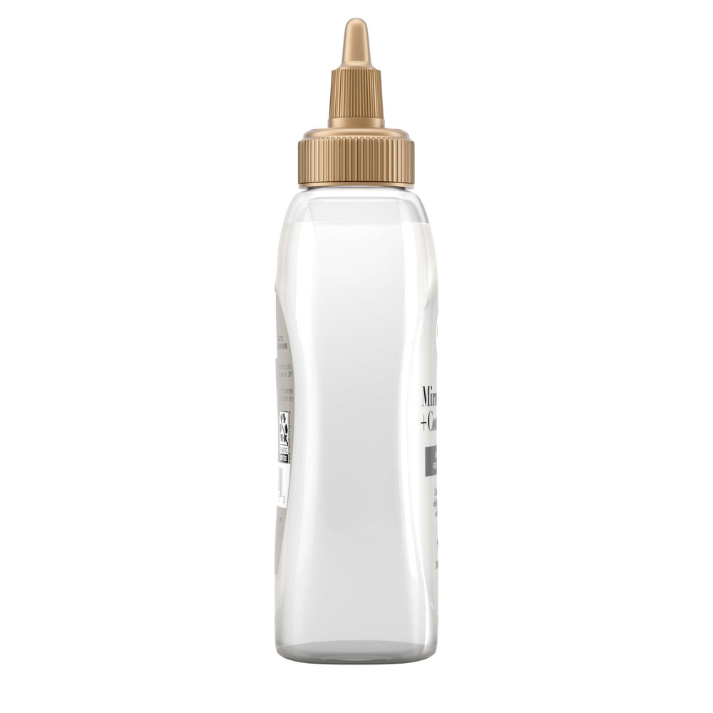 OGX coconut ingredient close-up, emphasizing natural oil nourishment