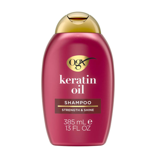 OGX front packaging of keratin oil shampoo showing bottle and benefits