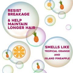 OGX label close-up on keratin oil shampoo highlighting ingredient callouts