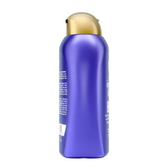OGX product label close-up listing keratin, purple fig, iris benefits