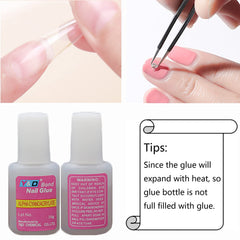 Ohlove glue being applied to a false nail tip for neat adhesion benefit