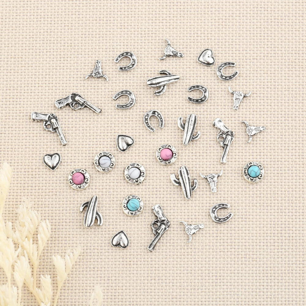 Ohmique charm applied to manicure showing easy application and durable hold
